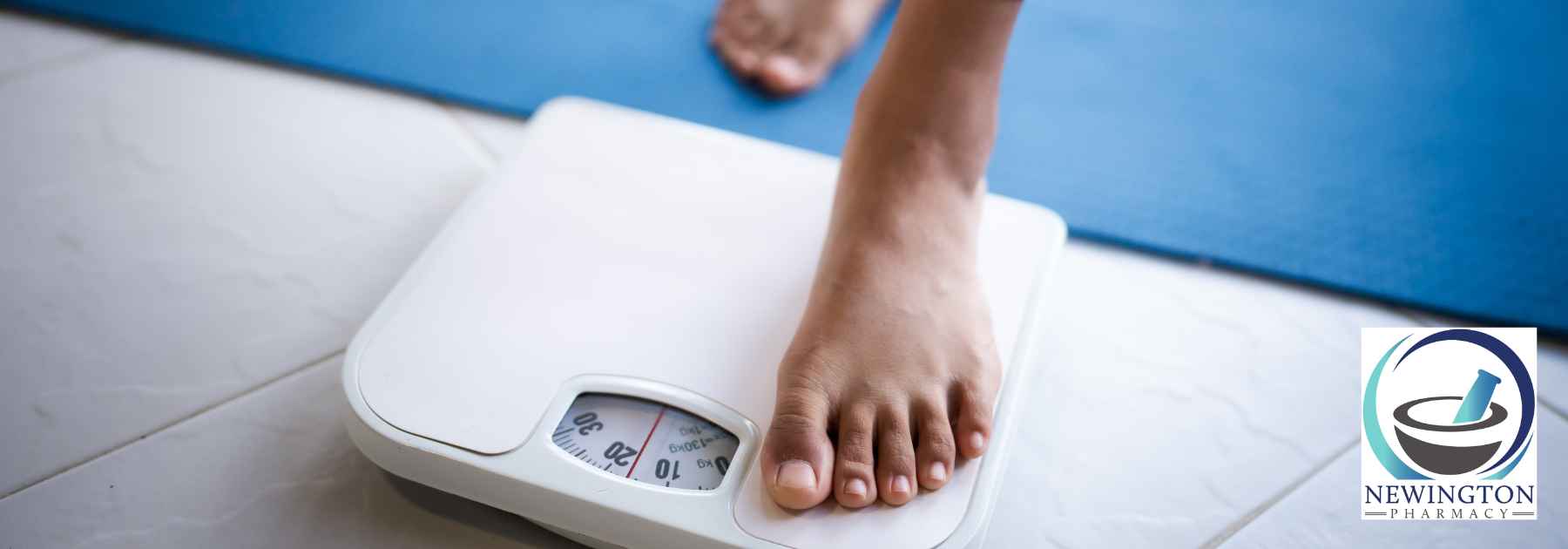 person in bare feet stepping on scales
