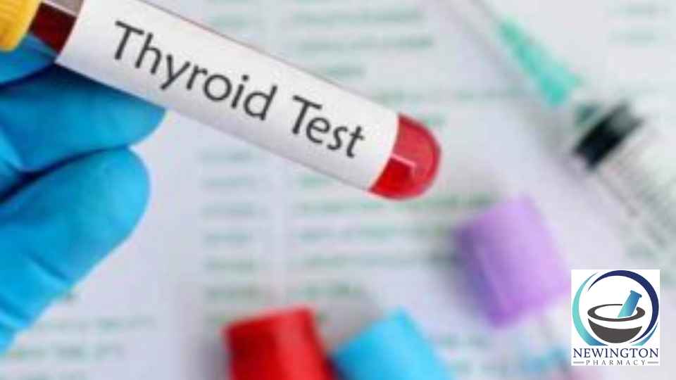 person in medical glove holding thyroid blood test