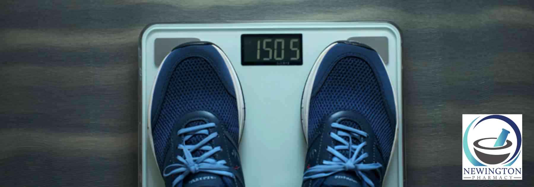 person in blue shoes standing on scales