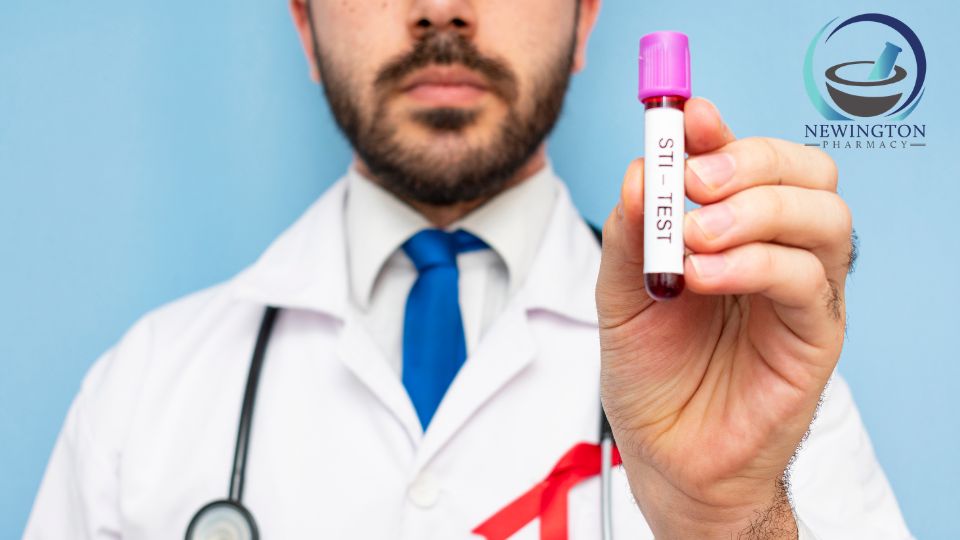 male doctor holding sti blood test