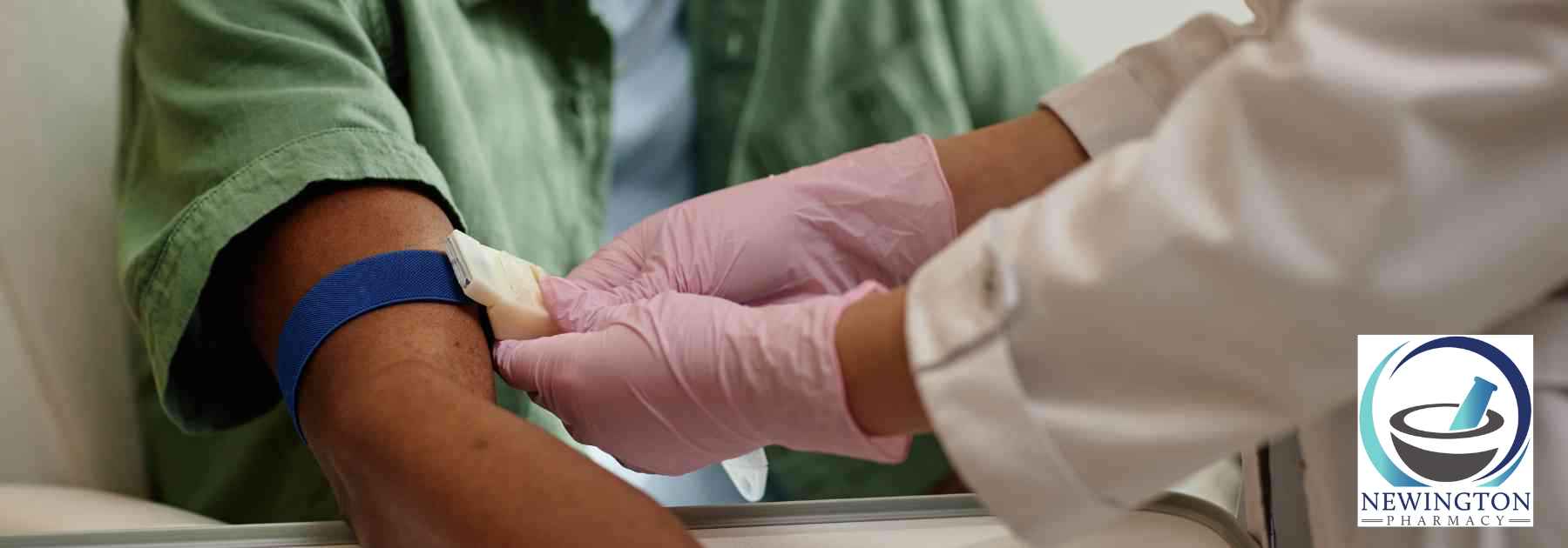 patient in green shirt receiving blood test