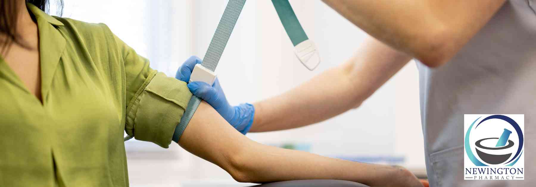 doctor preparing female patient for blood test