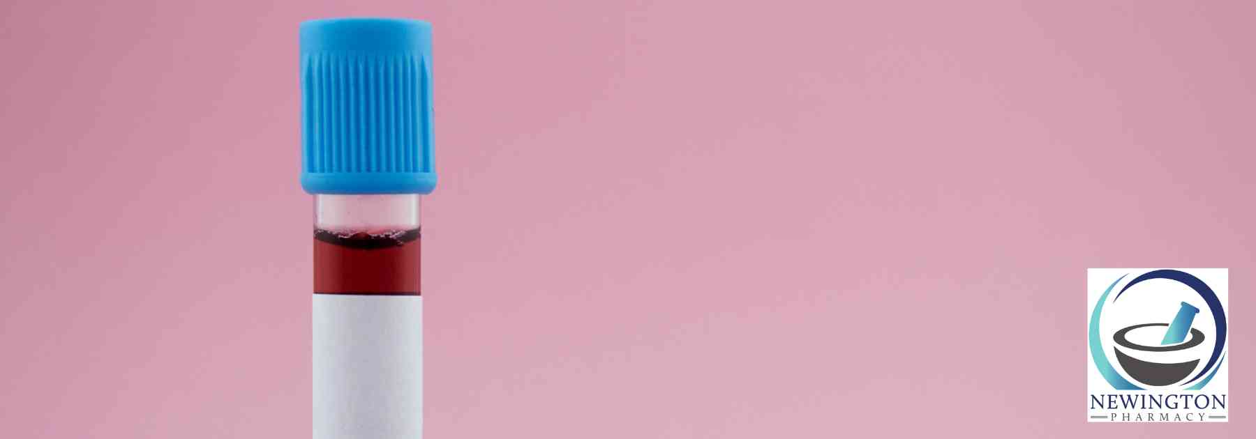 single blood test on pink background
