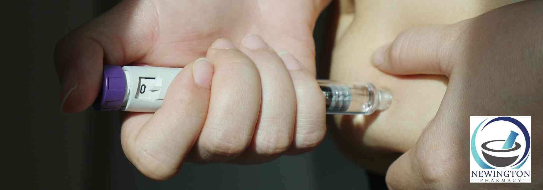 person using weight loss injection in dark area