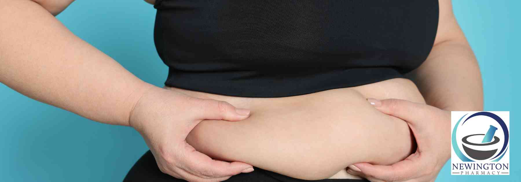 overweight woman in workout gear clutching stomach