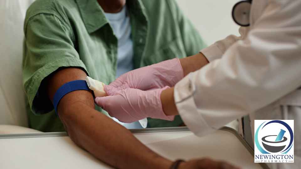 patient in green shirt at blood test appointment
