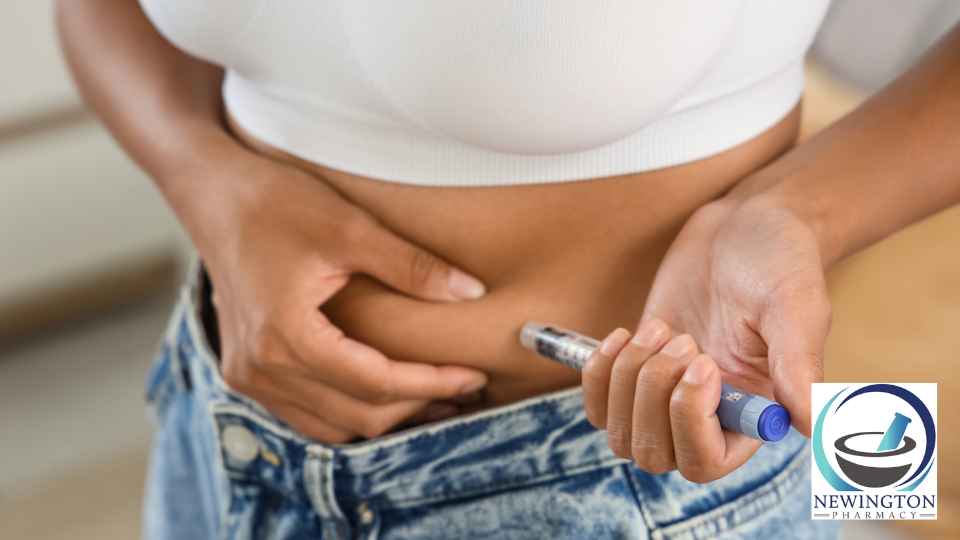 woman in white crop top and jeans using weight loss injection