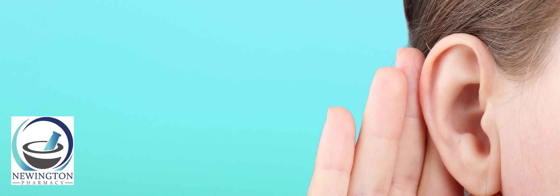person holding their ear on turquoise background