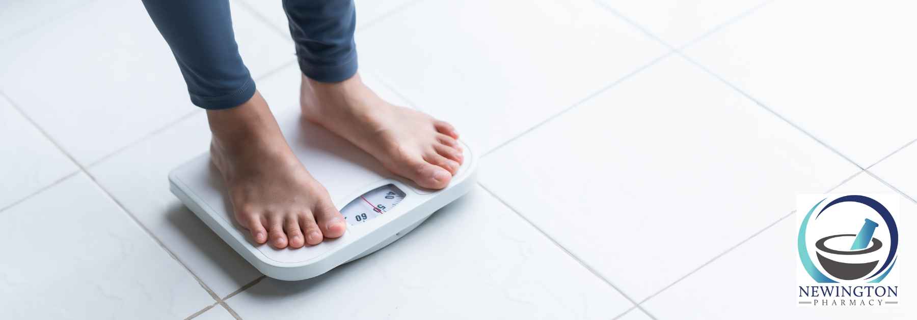 person in bare feet standing on scales