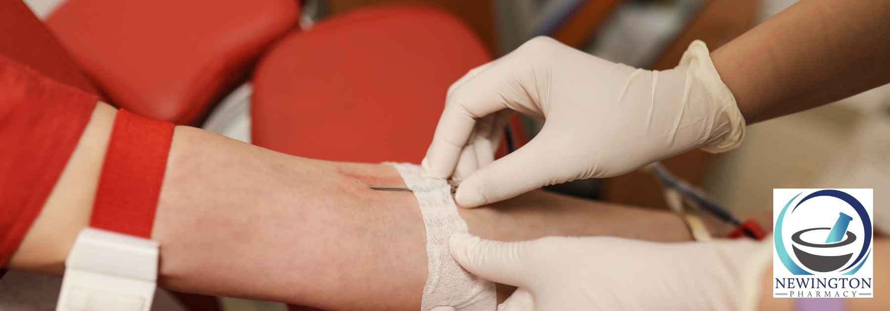 patient in red shirt receiving blood test